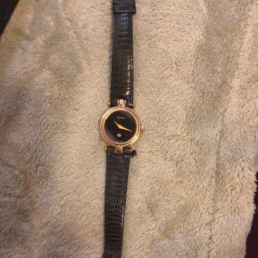 Gucci Black & Gold Tone Vintage Watch 10K gold with original band.4500L